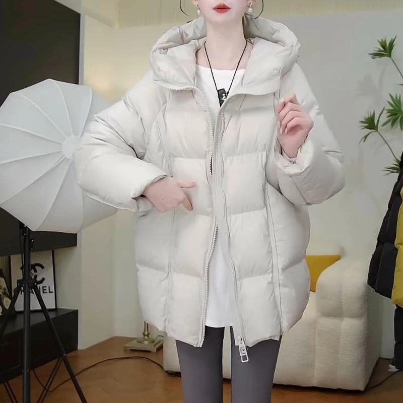 纯色泡芙中长款连帽加厚保暖棉服女2025冬季新款宽松显瘦爆款棉衣