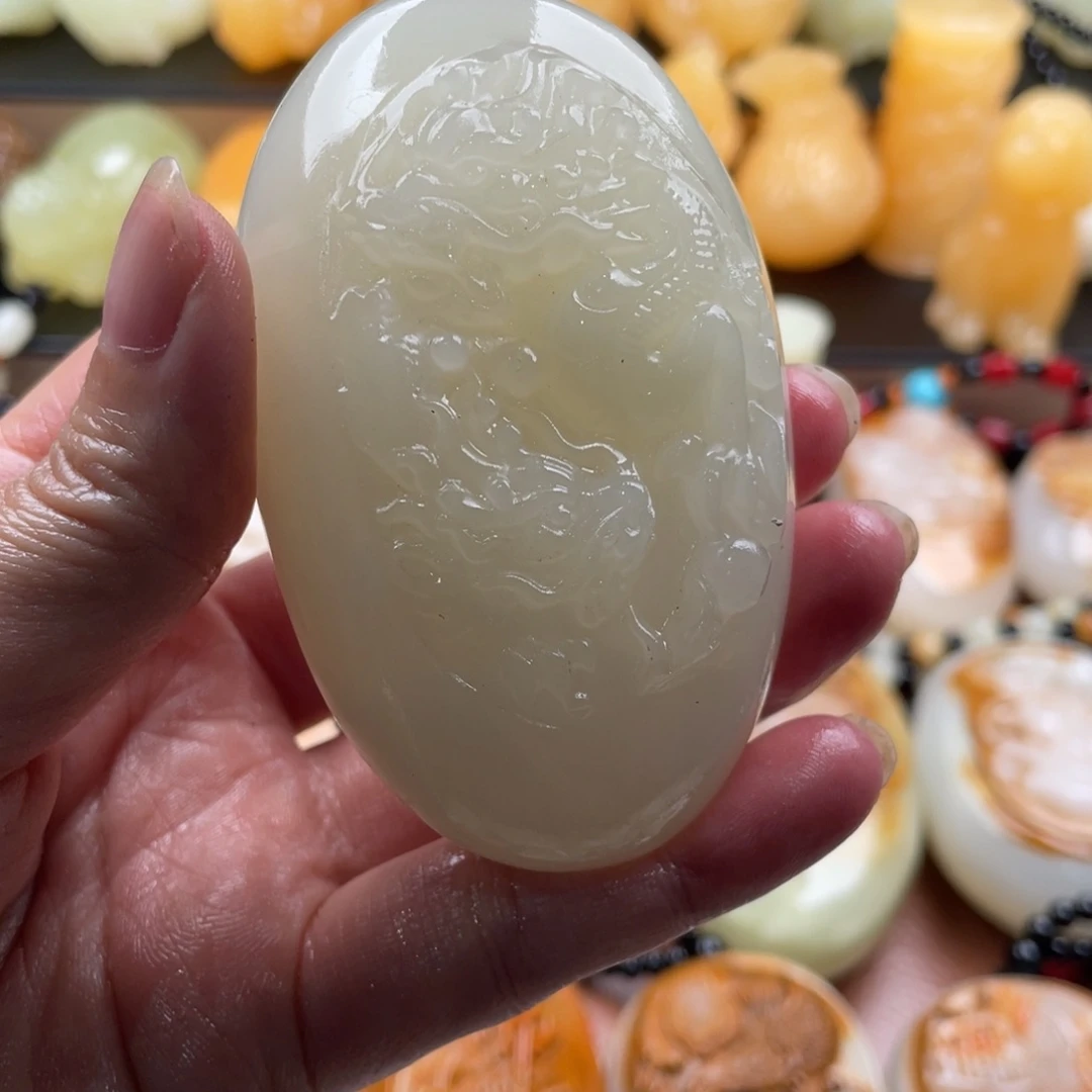 似***来石材天然古青石手把件