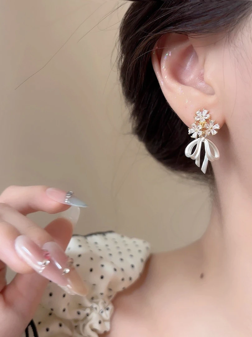 925银耳饰 精致蝴蝶结蚊香盘耳夹无耳洞耳饰新款轻奢高级银针耳环