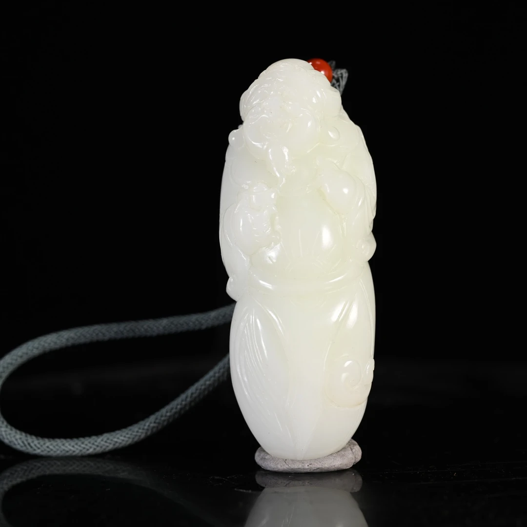 Lot8832 25YU104399 和田玉财神手把件/匡时