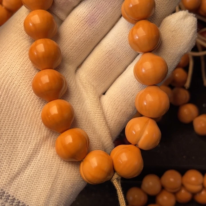 揽****猴头核桃手串屁桃