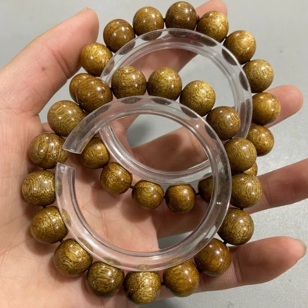 W652乌金料金丝楠卡1.2圆珠单圈小手串