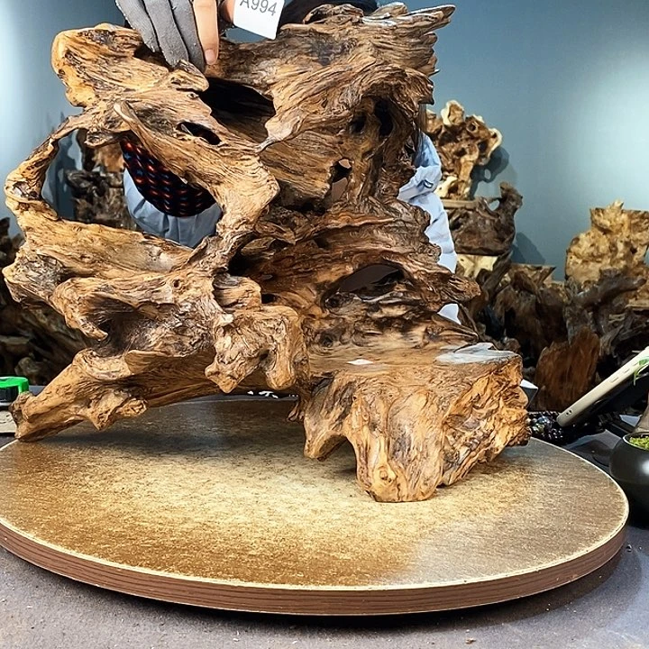 茶盏老****）994。株木随行根艺