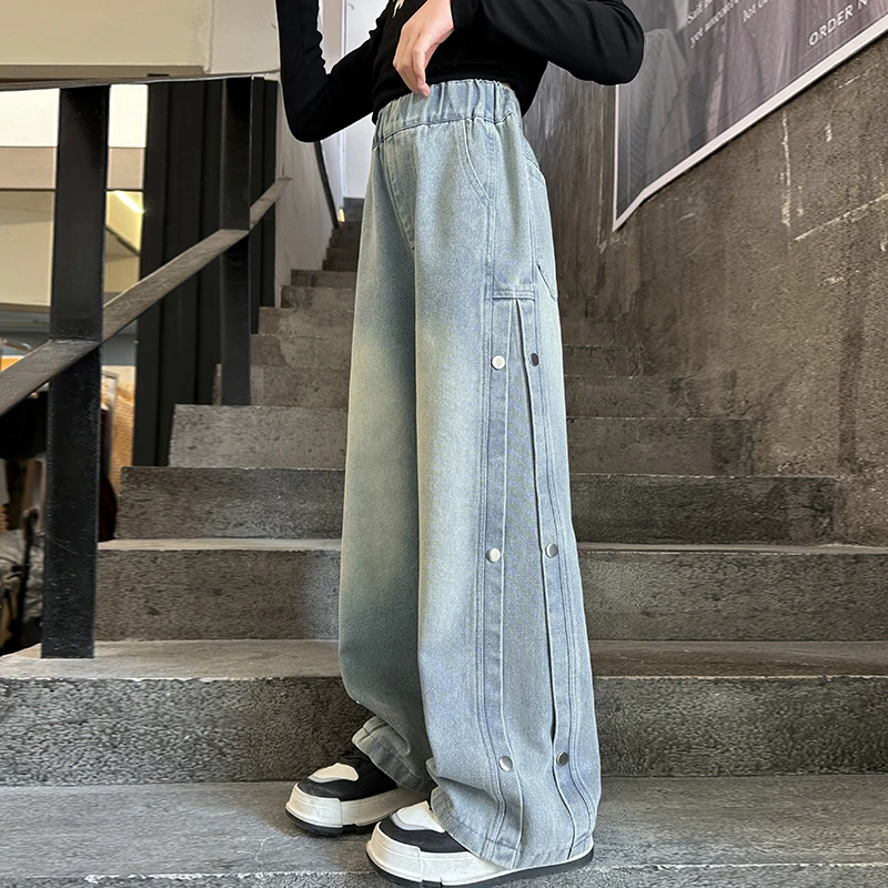 女童裤子春秋2025新款中大童韩版洋气侧边钉扣渐变牛仔阔腿裤潮款