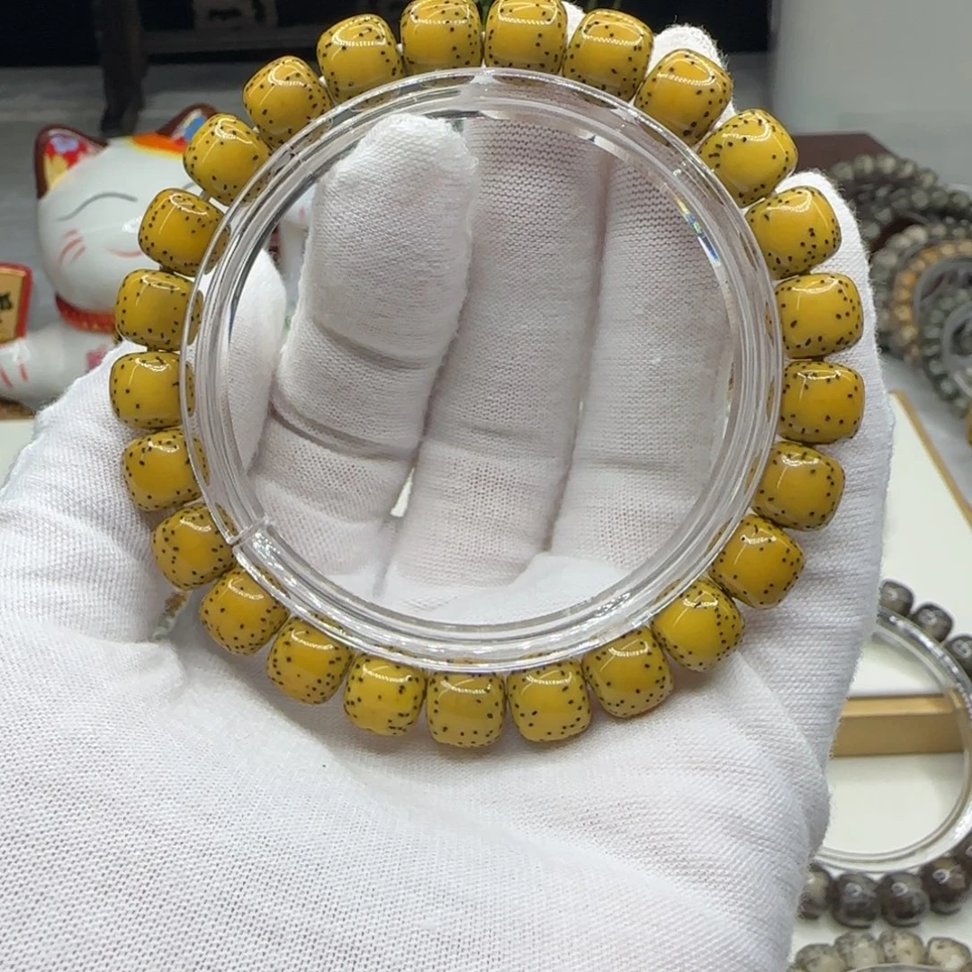 手串星月菩提鸡油黄9.5×8.5同枝果a12