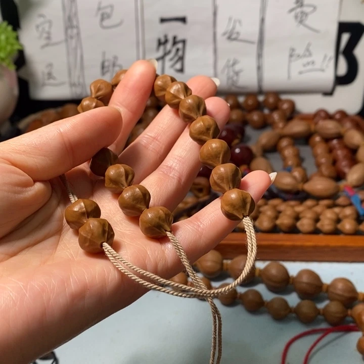 J***泽橄榄核手串2111精品蒜头小红铁小公主系列18+2颗+3通