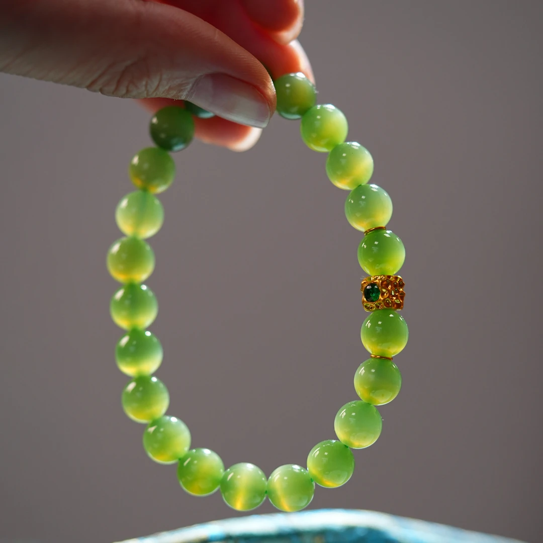 【大表姐珠宝】俄罗斯天然和田玉冰底一线天猫眼8mm圆珠手串18k金