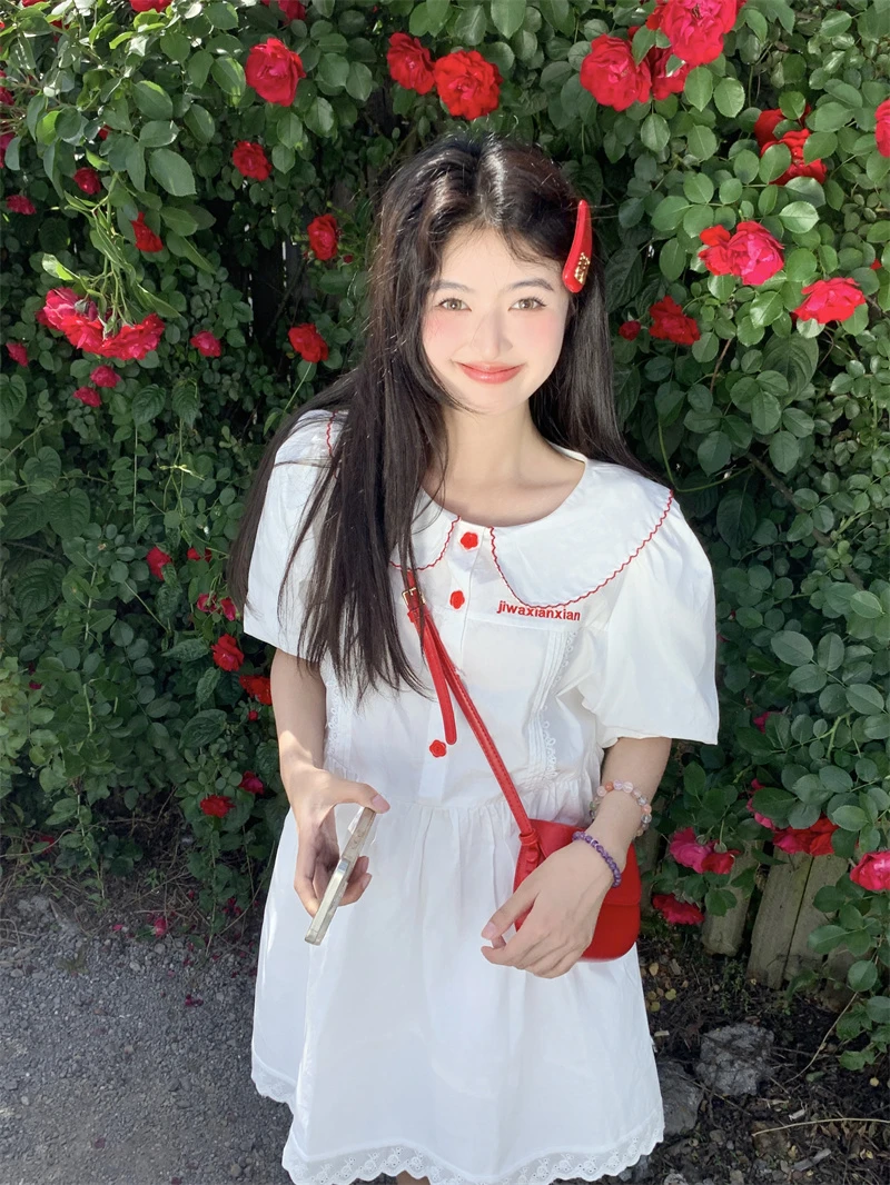 韩系甜美减龄重工刺绣娃娃领拼接花边泡泡袖连衣裙 A31236#