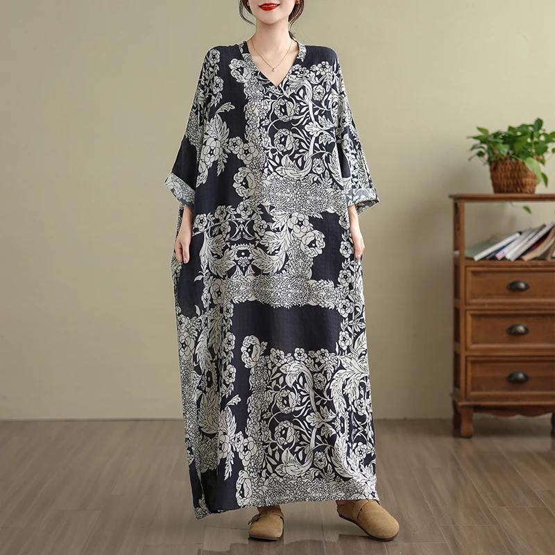 2025早秋新款花色度假风旅游圆领复古长裙遮肉棉麻长袖减龄连衣裙