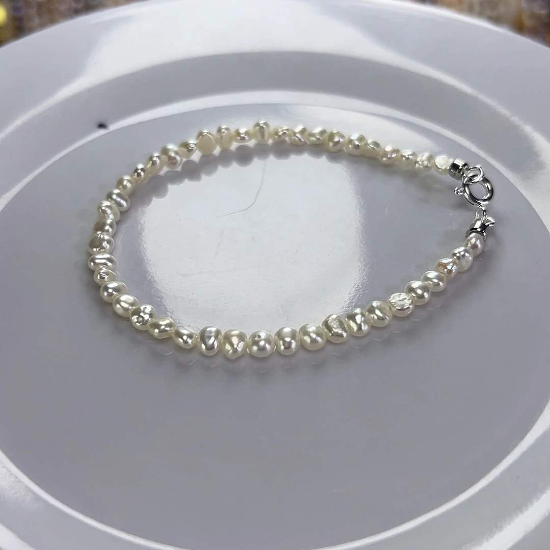 手绳淡水珍珠钛钢