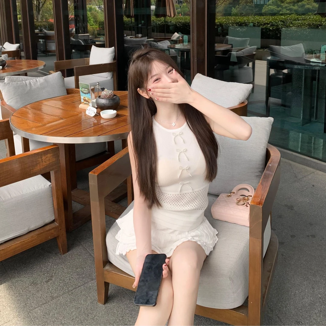 白月光穿搭小香风气质珍珠蝴蝶结镂空针织背心荷叶蛋糕短裙两件套