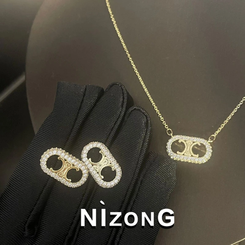 铜合金锆石耳饰 金色镂空门耳钉01ED459