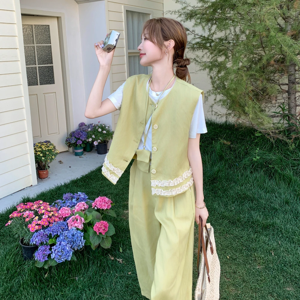 五一穿搭一整套蕾丝拼接黄色马甲2025夏季气质轻熟风阔腿裤两件套