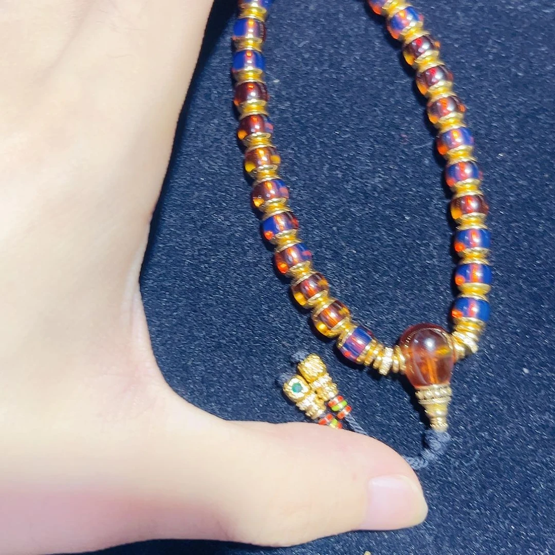 蓝珀银S925镀金镶嵌珠宝奇石7mm墨西哥红蓝手持