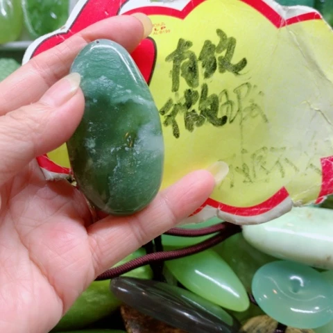 未镶嵌蛇纹石玉手把件