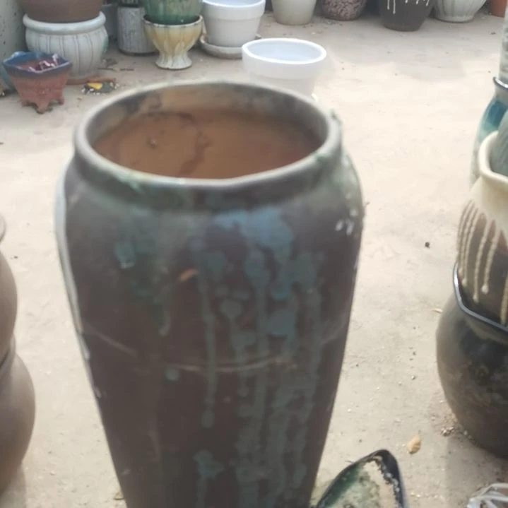 红陶瑕疵口17高40