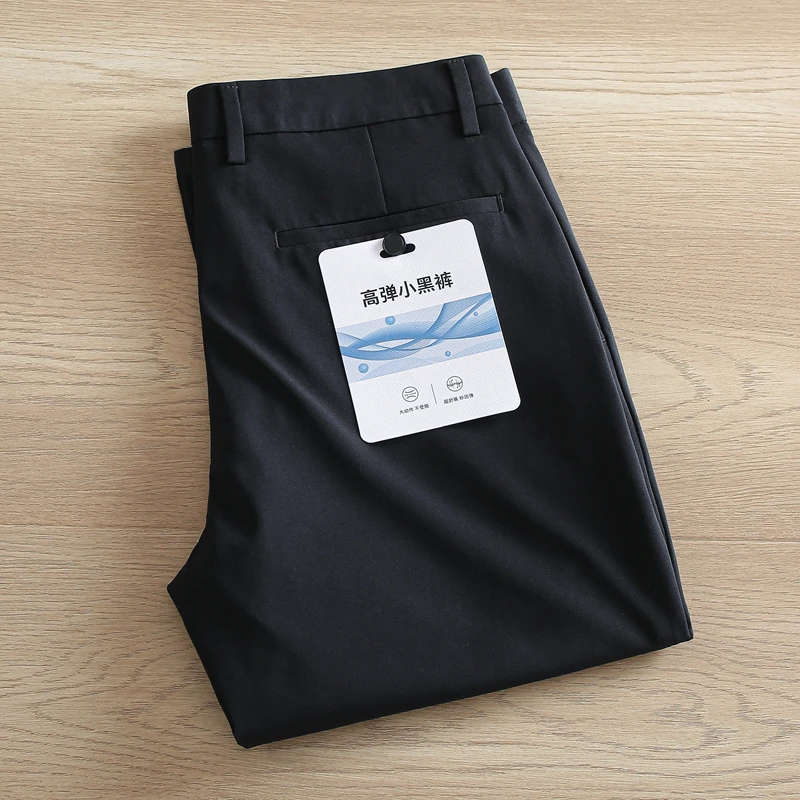 高弹舒适一线品牌撤柜男裤纯黑色休闲裤男款夏季薄款商务修身长裤