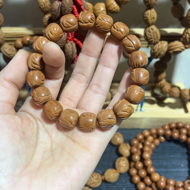 静***远野生桃桃枭手串精品