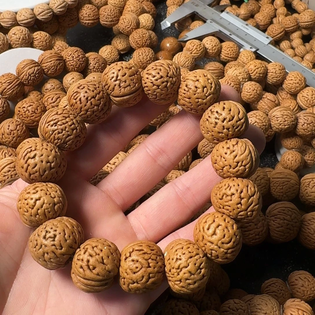 小***诺吊坠桃核苹果园手串