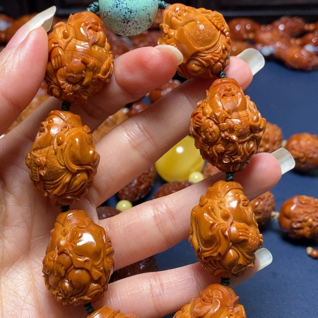 刘***机橄榄核手串/手链回血财神