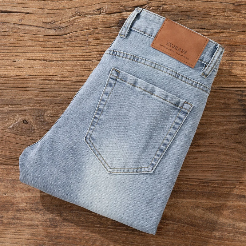 2025秋冬新款爆款复古浅蓝色牛仔裤男士修身小脚弹力百搭九分长裤