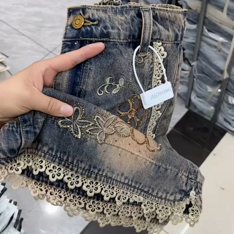 新款时尚洋气蕾丝边刺绣牛仔短裤女宽松显瘦百搭遮肉减龄短裤子