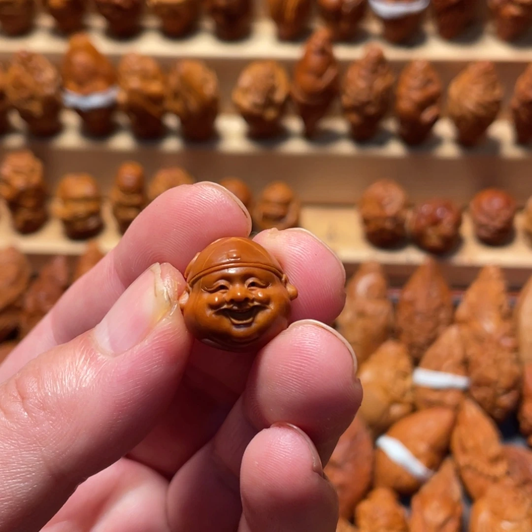 橄榄核吊坠地主头