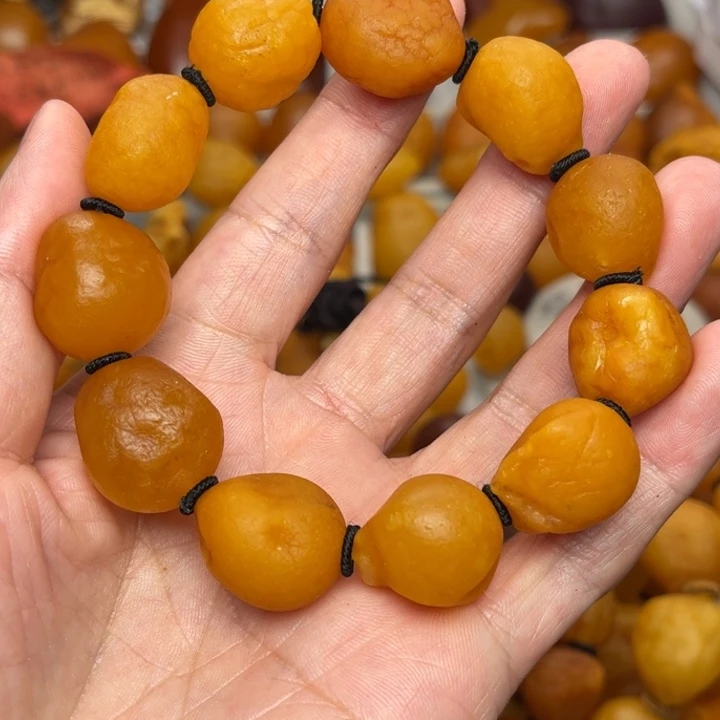 倔***牛琥珀未镶嵌裸石天然蜜蜡手串