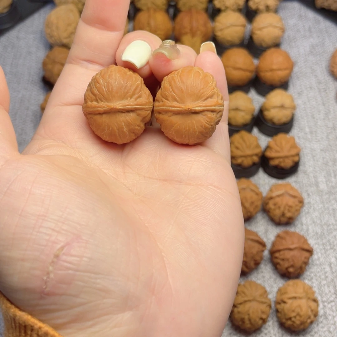 白***白把件文玩核桃小元宝