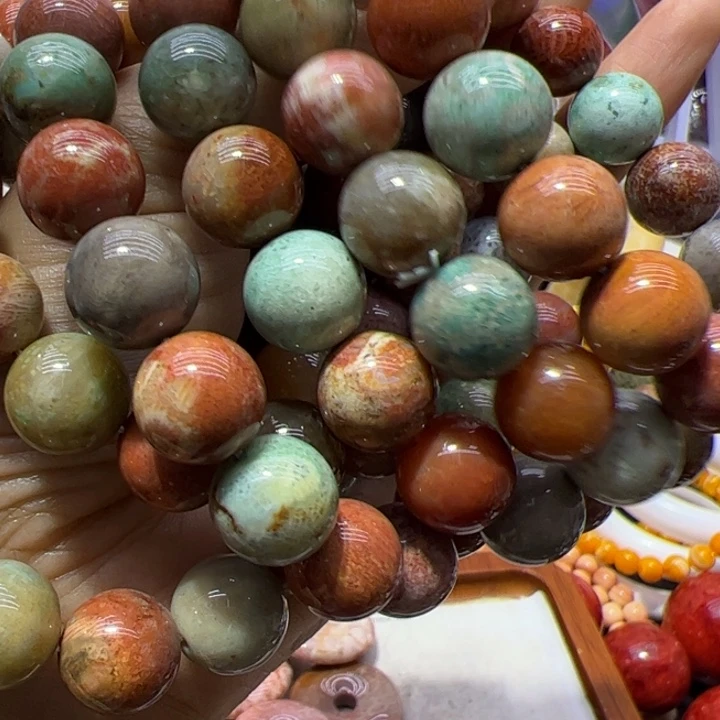 大果紫檀（缅甸花梨）1.3圆珠绿姑娘玉