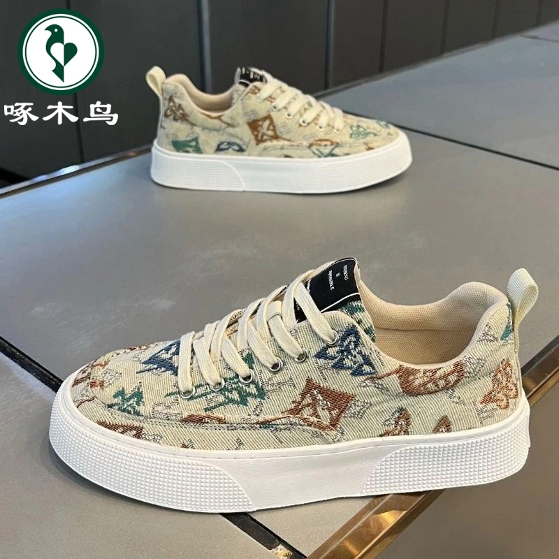 【正品】啄木鸟男鞋冬季透气潮流百搭休闲帆布鞋子男款低帮运动板鞋