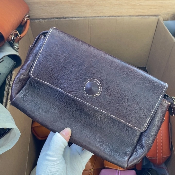 头层牛皮瑕疵单肩包放手机