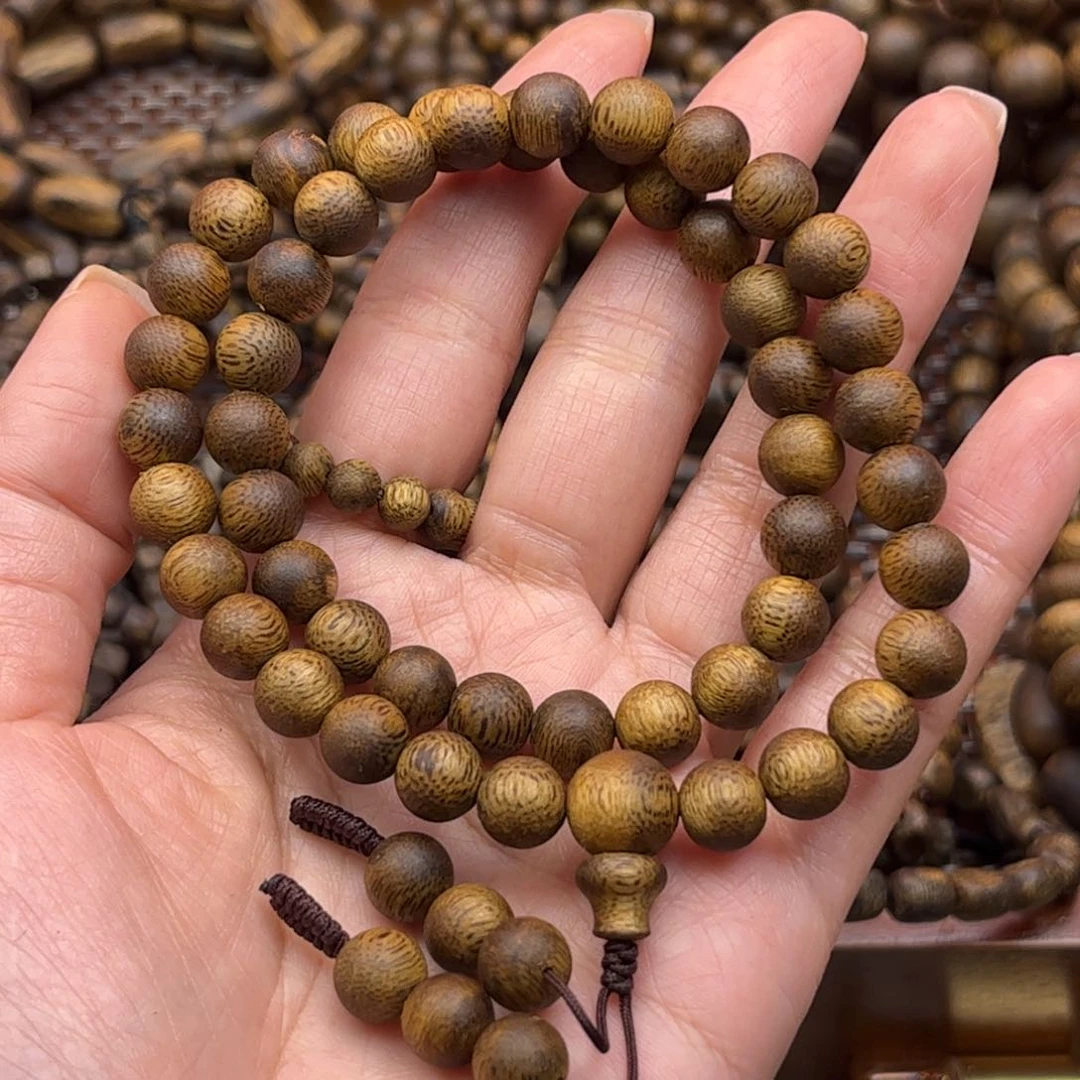 沉香碎屑奇楠0.8双圈圆珠11克