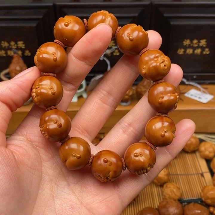 橄榄核手串大*头一青老师百态