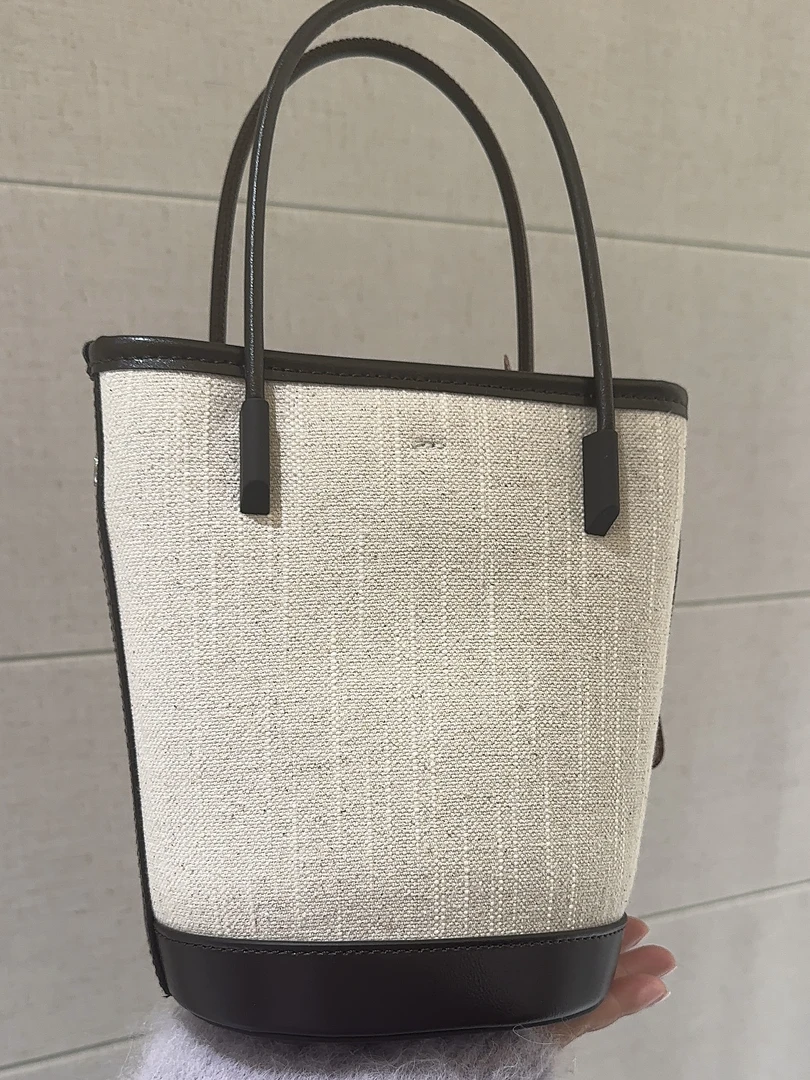 洋包贩售-轻量时尚 早春竹节麻松弛感水桶包袋