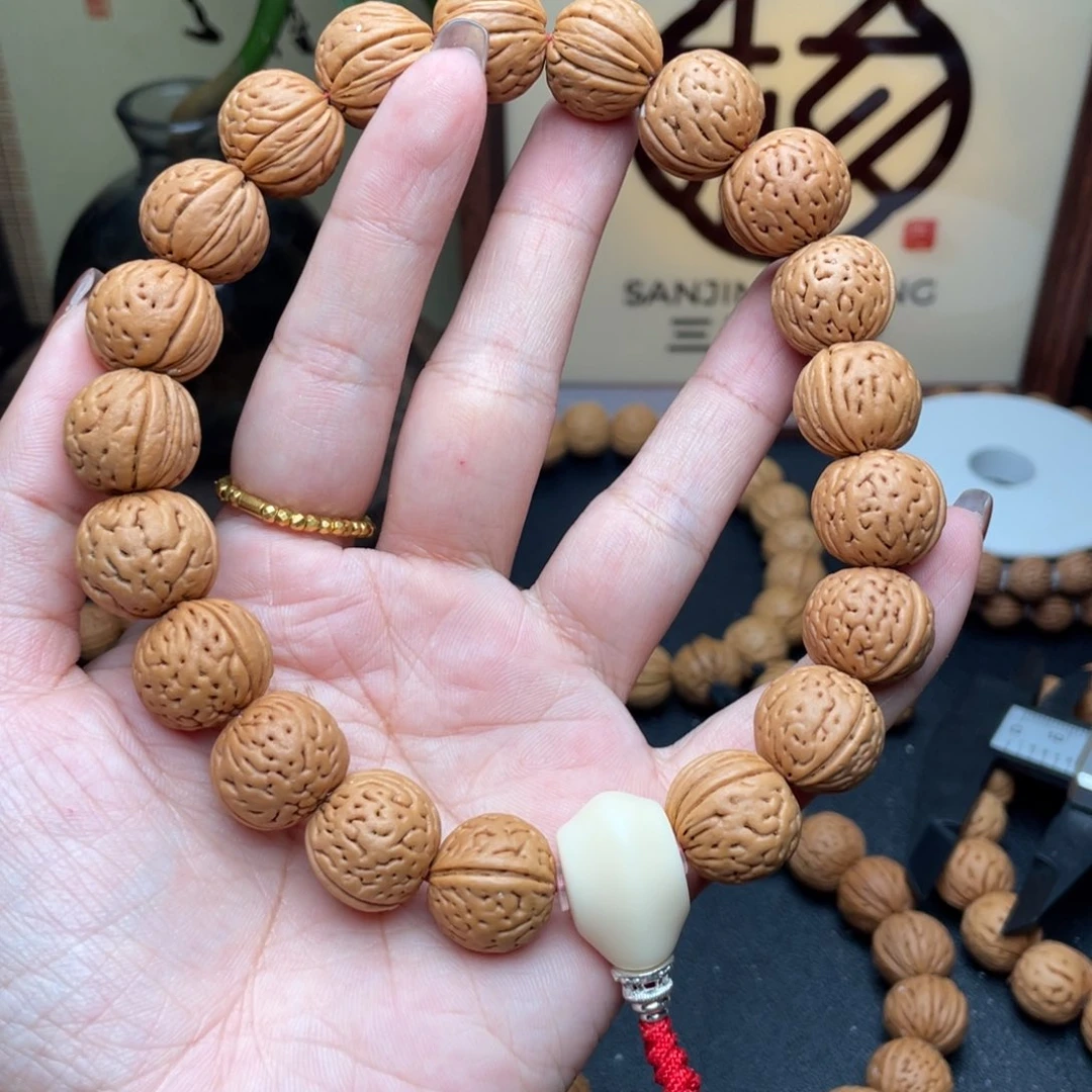 微***15野生灯笼桃核手持