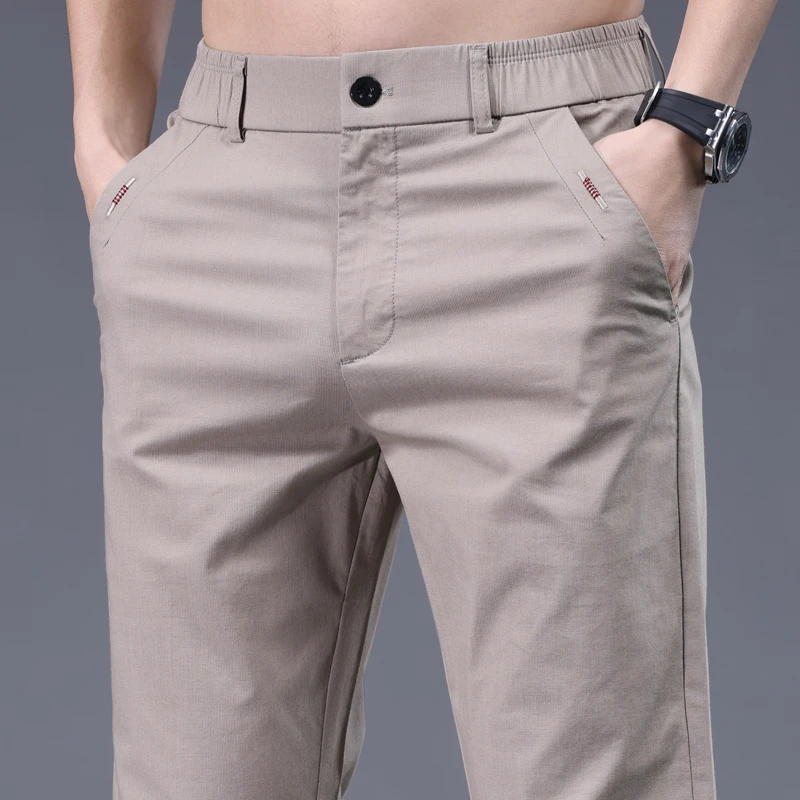 莱赛尔面料夏季薄款牛仔裤男原创刺绣蜜蜂高端白色长裤轻奢绿色裤