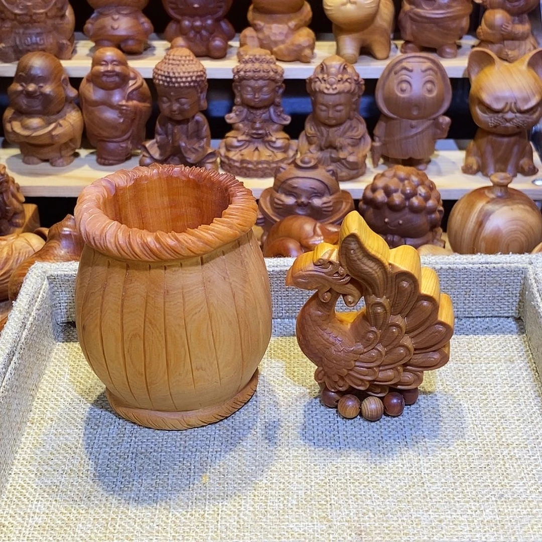 娜***娜木崖柏木雕手把件