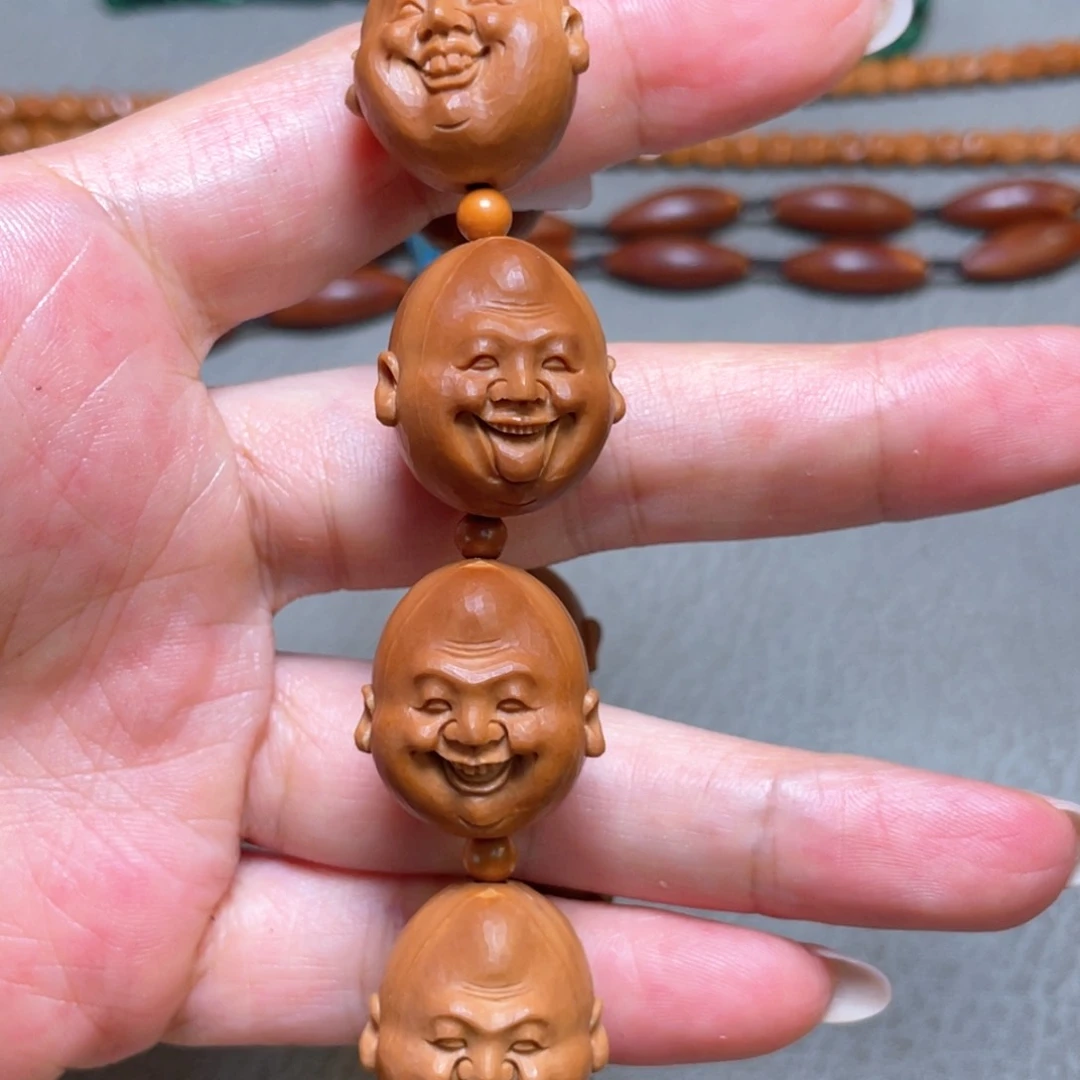 橄榄核吊坠大师兄笑佛