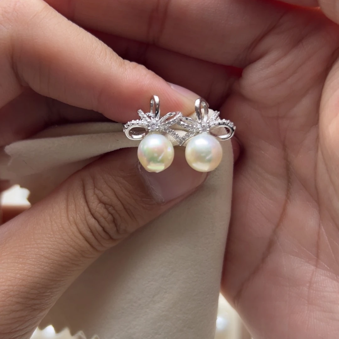 银S925镶嵌耳钉海水珍珠7.8mm近圆海水Ak蝴蝶结耳钉