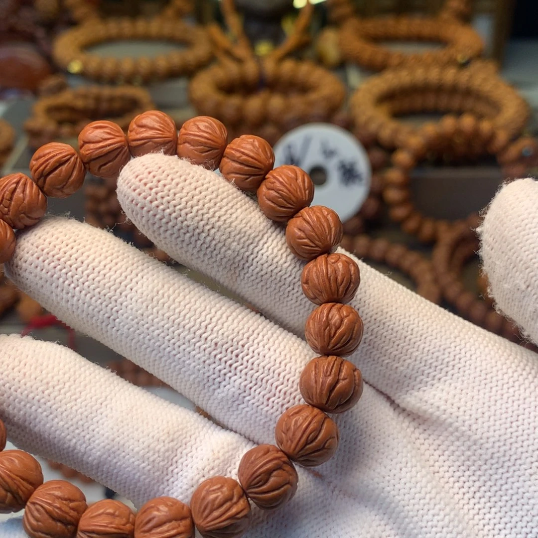 K***x桃核手串秦岭龙纹