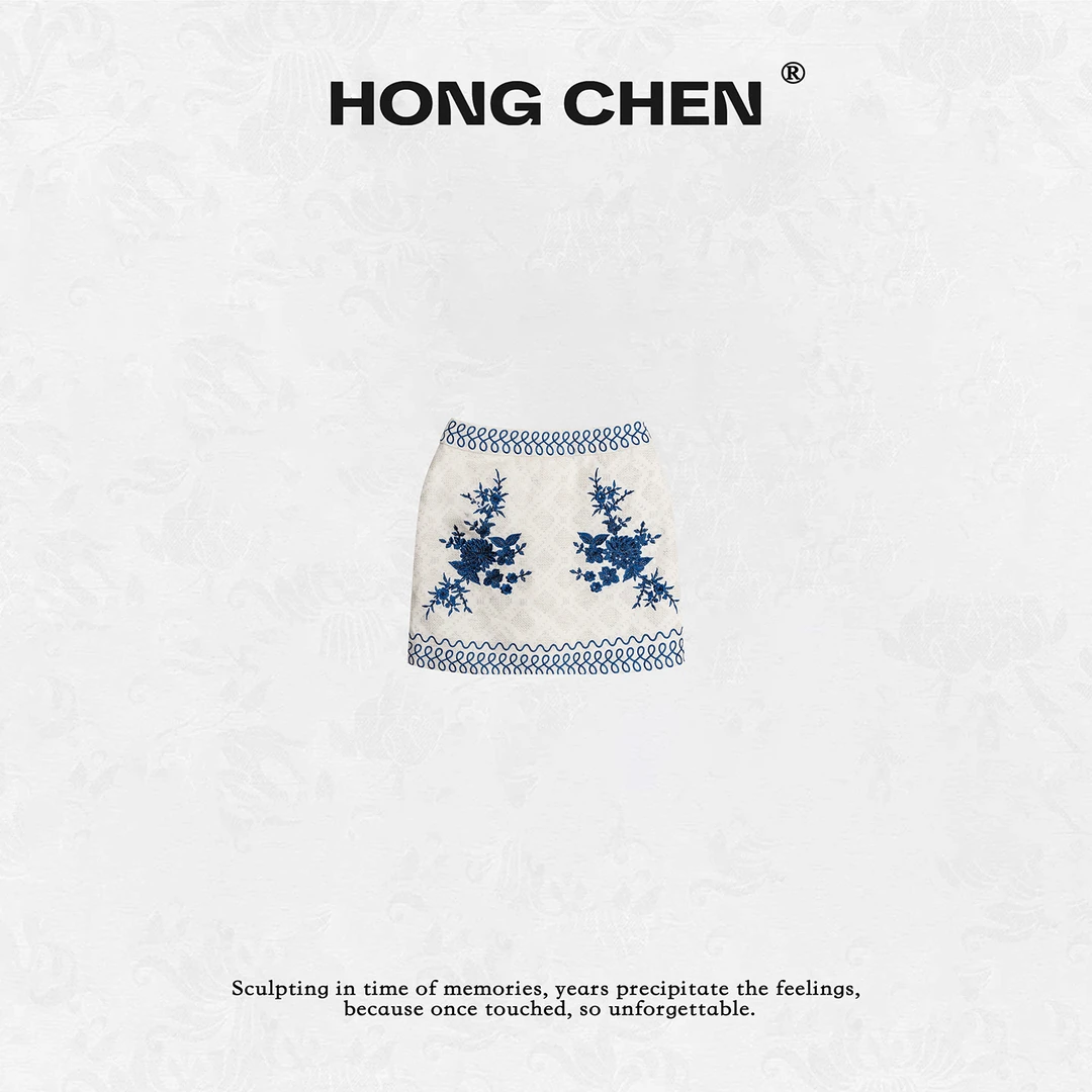 【虹辰】高端时尚优雅刺绣撞色钉珠气质百搭高级青花瓷短裙--HC2399