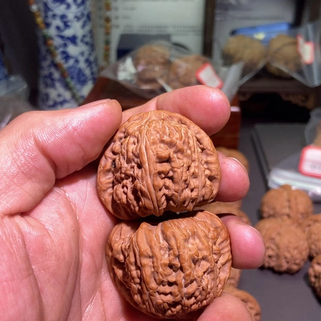 桃核把件平**福白狮子核桃