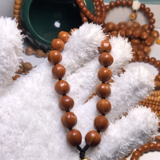 橄榄核吊坠1.25+鲨鱼背手持