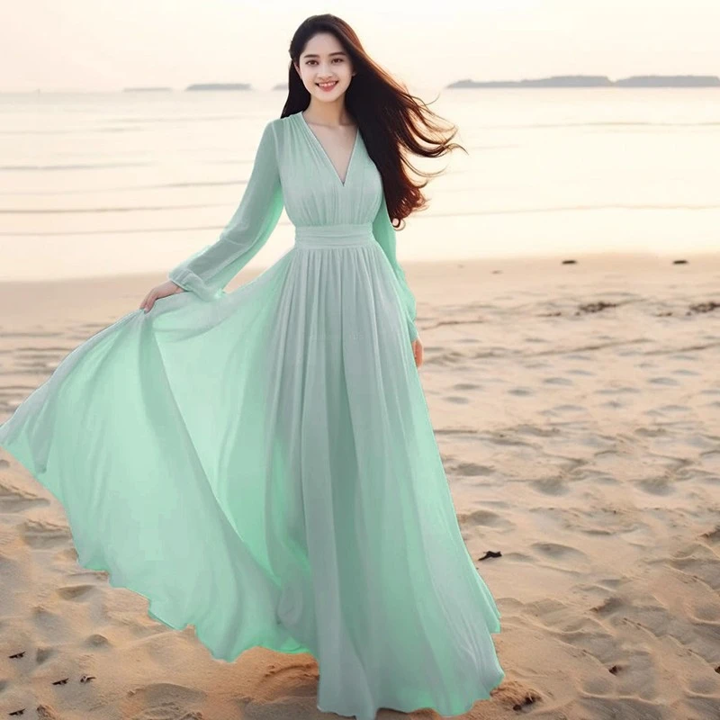三亚海边度假沙滩裙高级感雪纺长版裙子V领灯笼袖白色仙女洋装