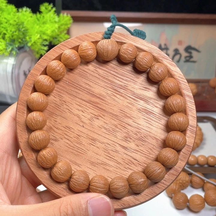 不***霜猴头核桃手串凤羽