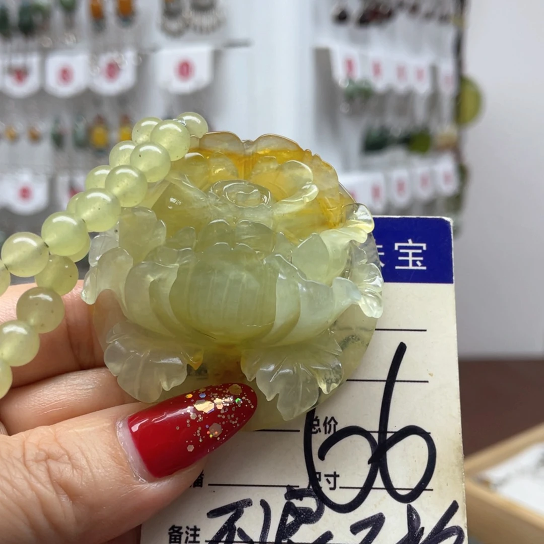 蛇纹石玉吊坠未镶嵌国***门