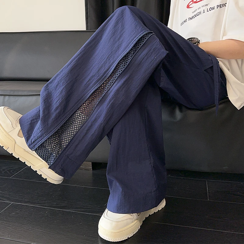 明尼凯冰丝速干裤子男款夏季降落伞兵工装裤侧边拉链美式冲锋裤潮