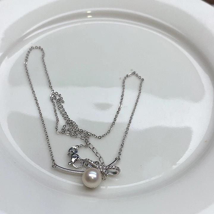 睡***哈合金吊坠淡水珍珠