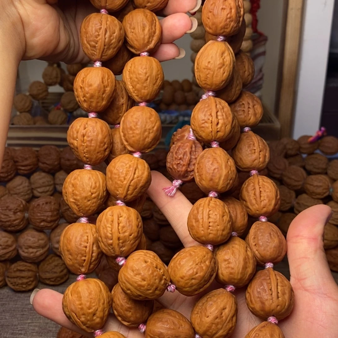 文玩核桃吊坠钱袋子54颗籽